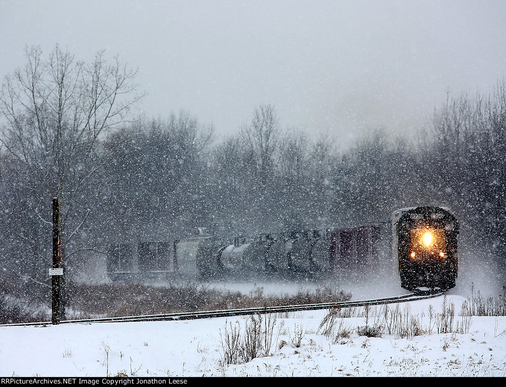 L326-06 heads east as the snow falls